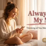 A woman smiling at her phone composing heartfelt thinking of you messages for him.